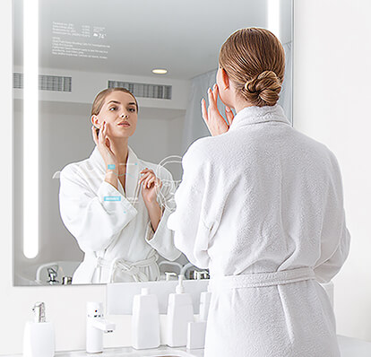 Woman using QAIO Smart Mirror