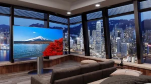 A spacious living room with a big TV and a stunning city view.