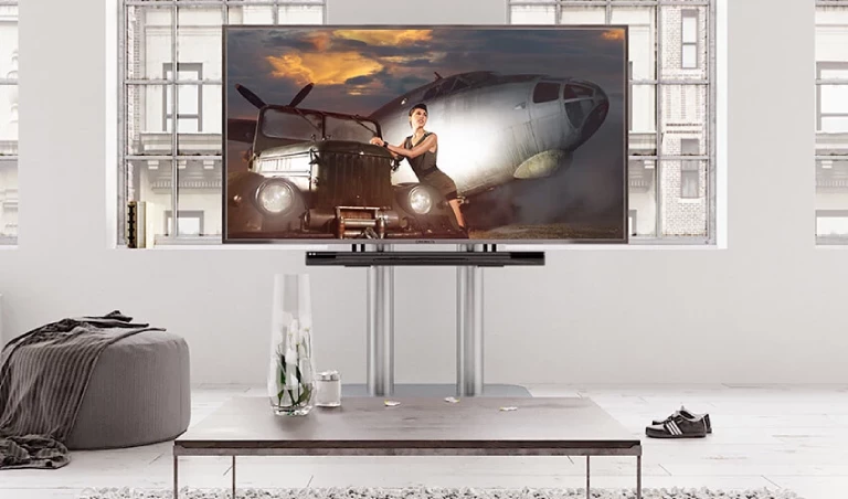Television on stand in a modern living room.