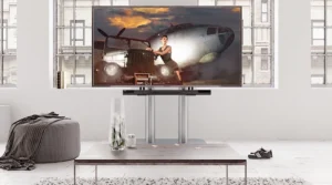 A TV displaying an image of a plane displayed in a living room.