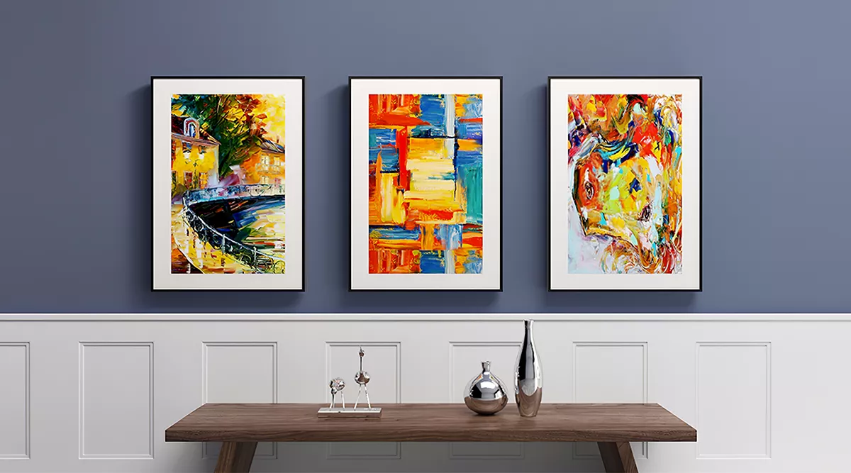 Stylish home decor with abstract art display on smart screen TV.